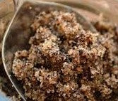 Photo of dark brown sugar scrub. Photo is a stock internet photo and does not represent product advertised.